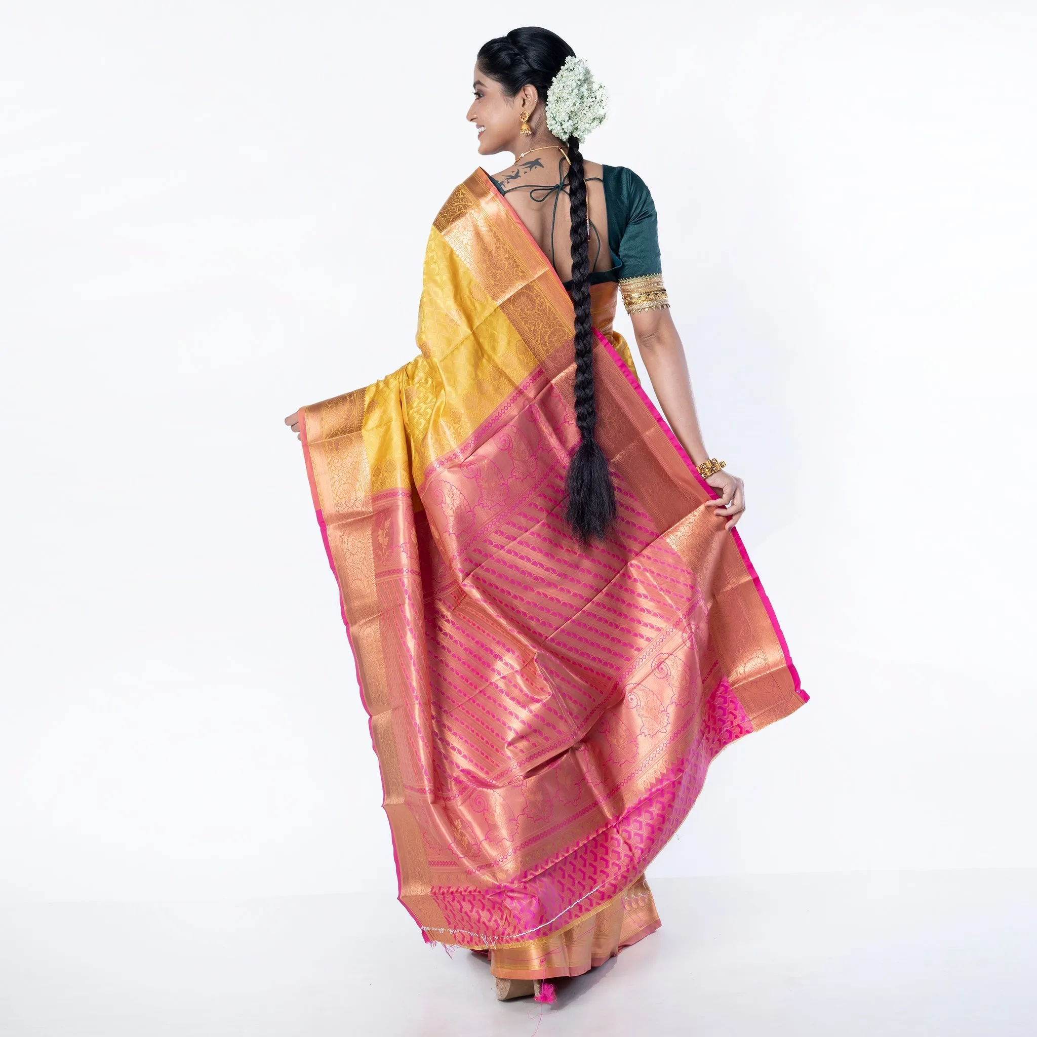 Women Kanjivaram Silk Saree In Mustard Yellow Color With Zari Motifs And Pallu