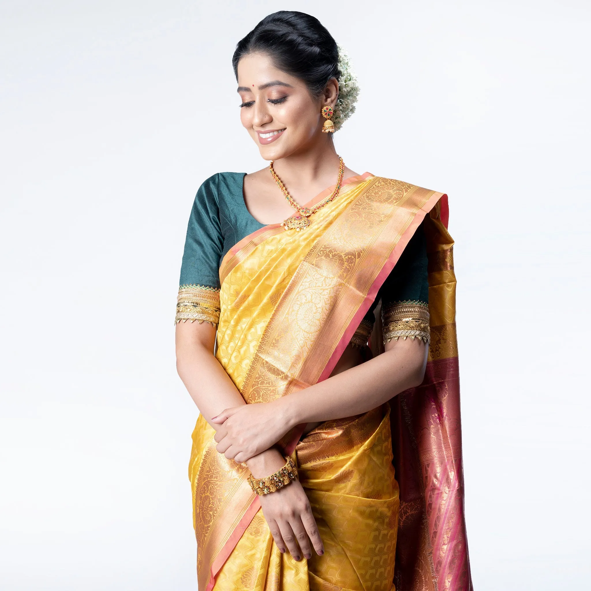 Women Kanjivaram Silk Saree In Mustard Yellow Color With Zari Motifs And Pallu