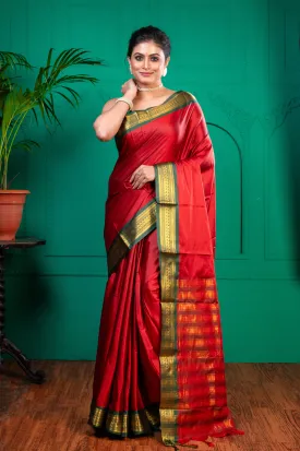 Women Red Aura Silk Saree With Contrasting Green And Golden Zari Border